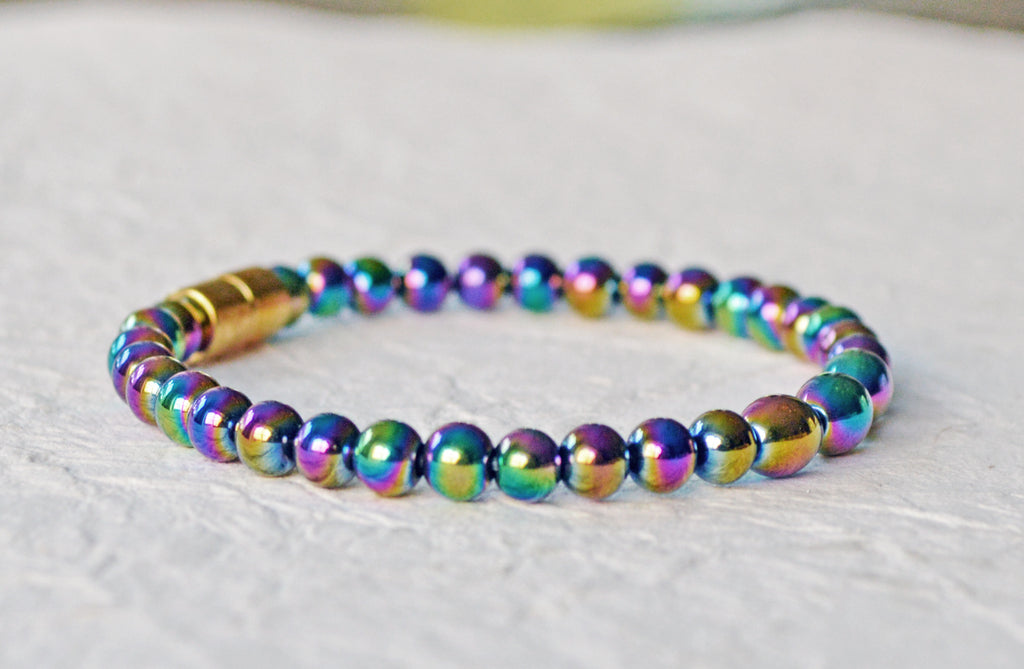 Magnetic bracelet handcrafted with iridescent rainbow hematite magnetic beads. Bracelet is secured with a strong and easy-to-use magnetic clasp.