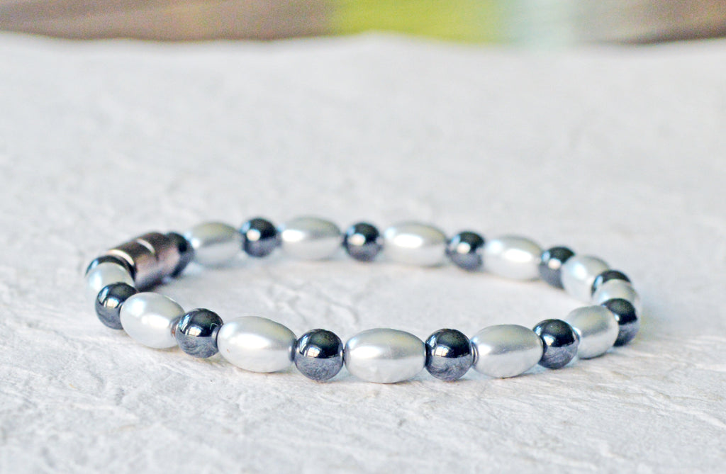 Magnetic bracelet handcrafted with alternating black and silver hematite magnetic beads. Bracelet secured with a sturdy, easy-to-use magnetic clasp.