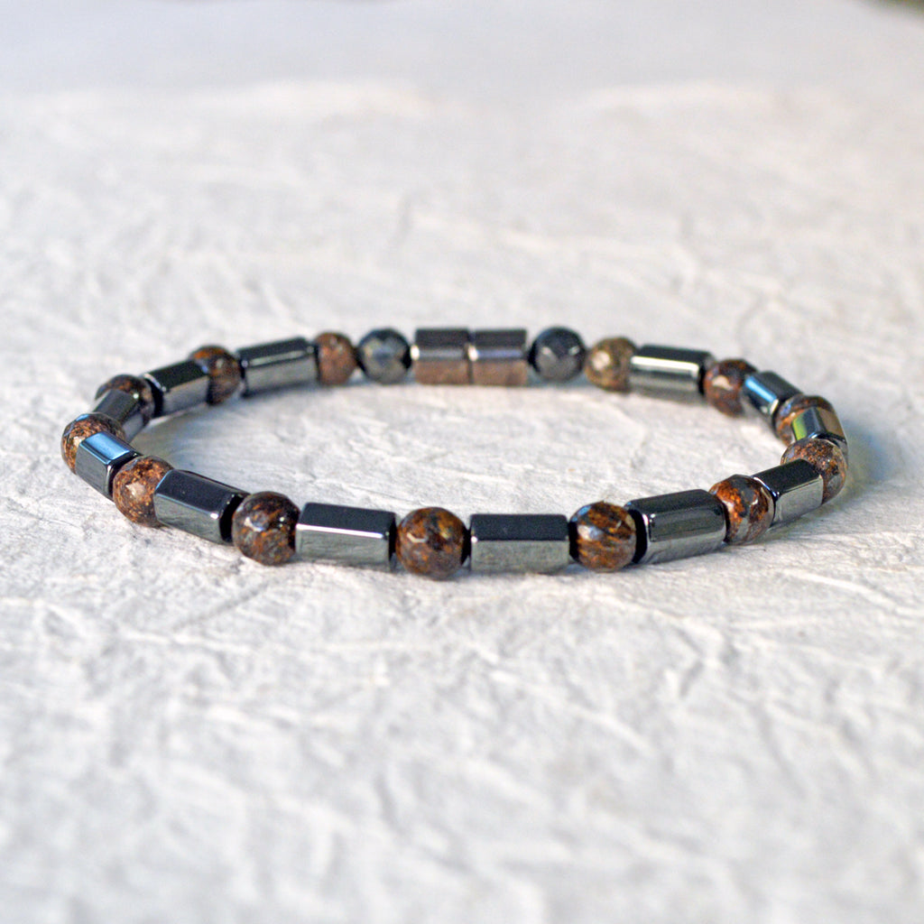 Hematite magnetic bracelet handcrafted with alternating black hematite magnetic beads and bronzite gemstone beads. Secured with a strong and easy-to-use magnetic clasp.