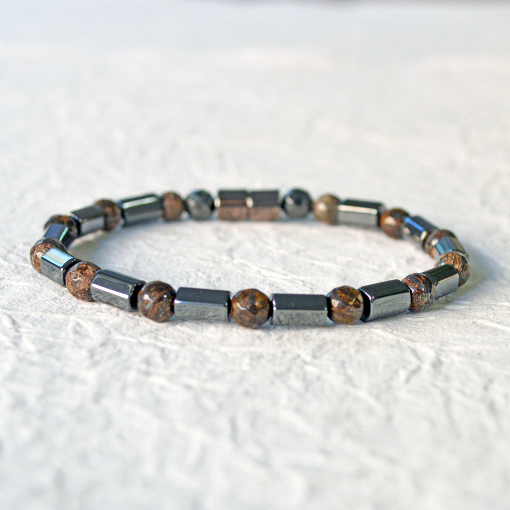 Hematite magnetic bracelet handcrafted with alternating black hematite magnetic beads and bronzite gemstone beads. Secured with a strong and easy-to-use magnetic clasp.