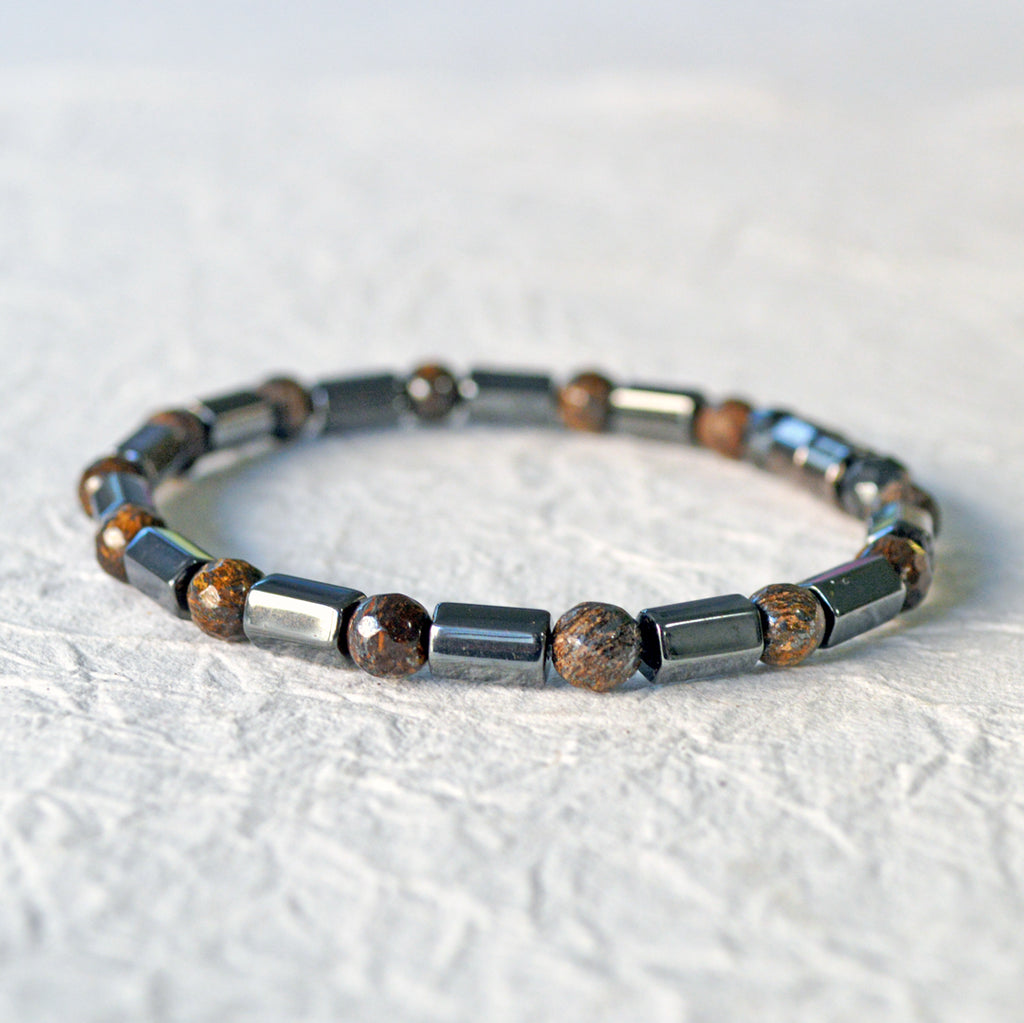 Hematite magnetic bracelet handcrafted with alternating black hematite magnetic beads and bronzite gemstone beads. Secured with a strong and easy-to-use magnetic clasp.