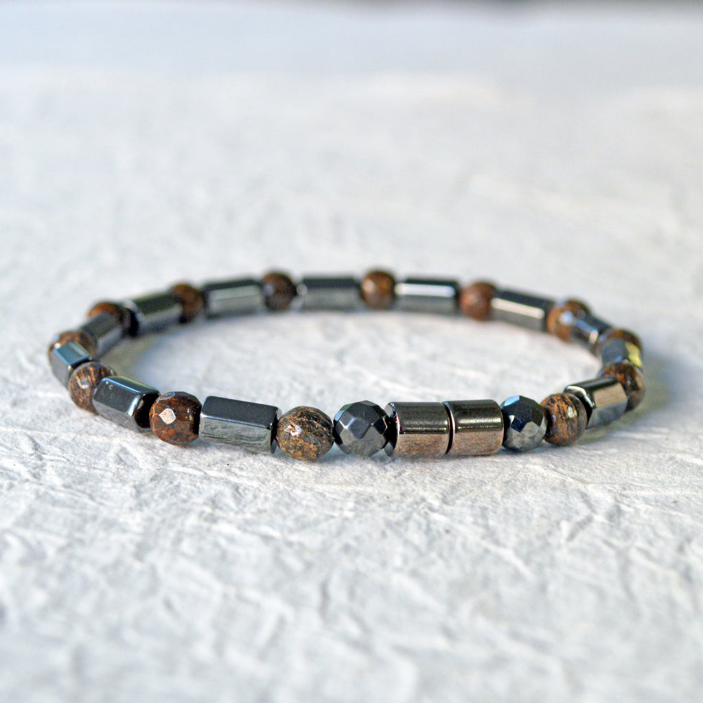 Hematite magnetic bracelet handcrafted with alternating black hematite magnetic beads and bronzite gemstone beads. Secured with a strong and easy-to-use magnetic clasp.