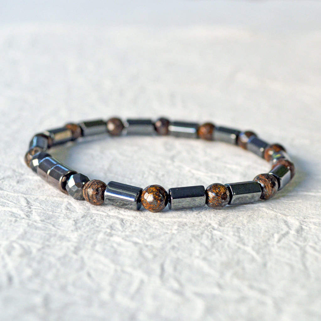 Hematite magnetic bracelet handcrafted with alternating black hematite magnetic beads and bronzite gemstone beads. Secured with a strong and easy-to-use magnetic clasp.