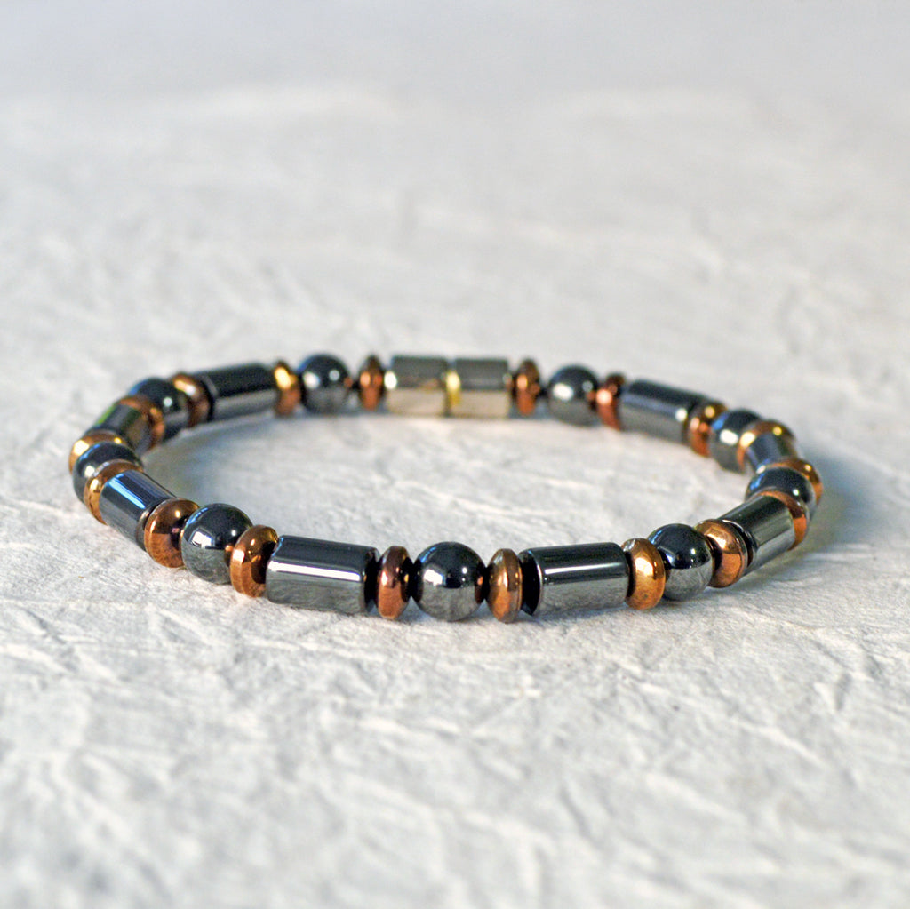 Black & Copper Magnetic Hematite bracelet handcrafted with powerful magnetic hematite beads. Bracelet is secured with a strong and easy-to-use magnetic clasp.