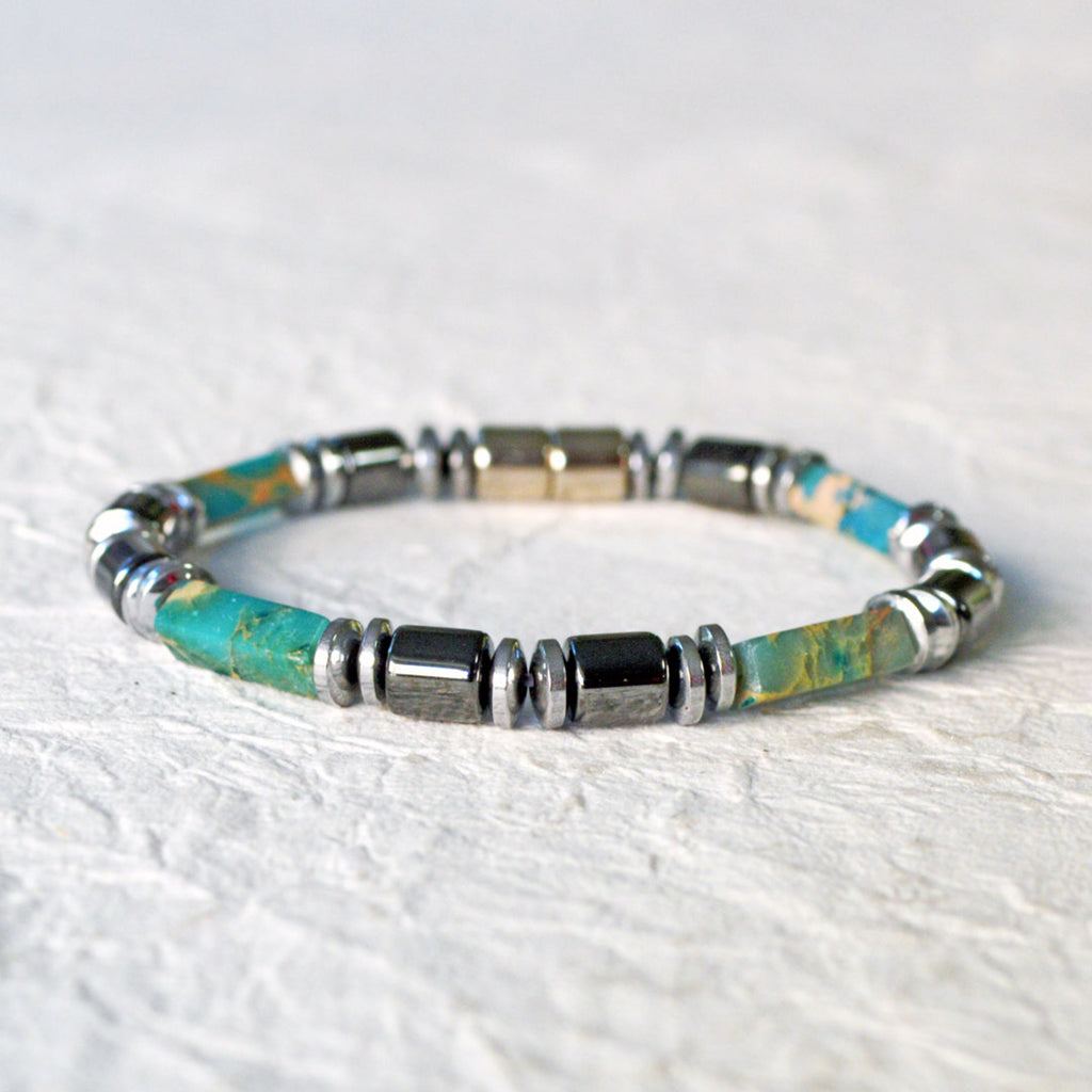 Magnetic bracelet handcrafted with black and silver magnetic hematite beads with impression jasper gemstone beads. Secured with a strong and easy-to-use magnetic clasp.