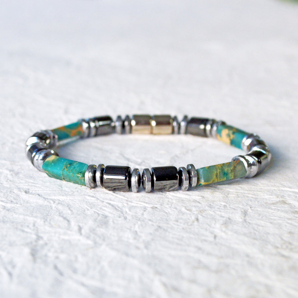 Magnetic bracelet handcrafted with black and silver magnetic hematite beads with impression jasper gemstone beads. Secured with a strong and easy-to-use magnetic clasp.