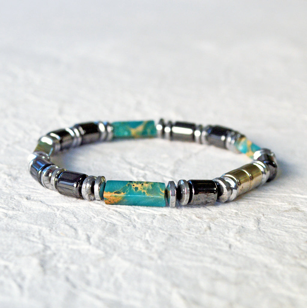 Magnetic bracelet handcrafted with black and silver magnetic hematite beads with impression jasper gemstone beads. Secured with a strong and easy-to-use magnetic clasp.