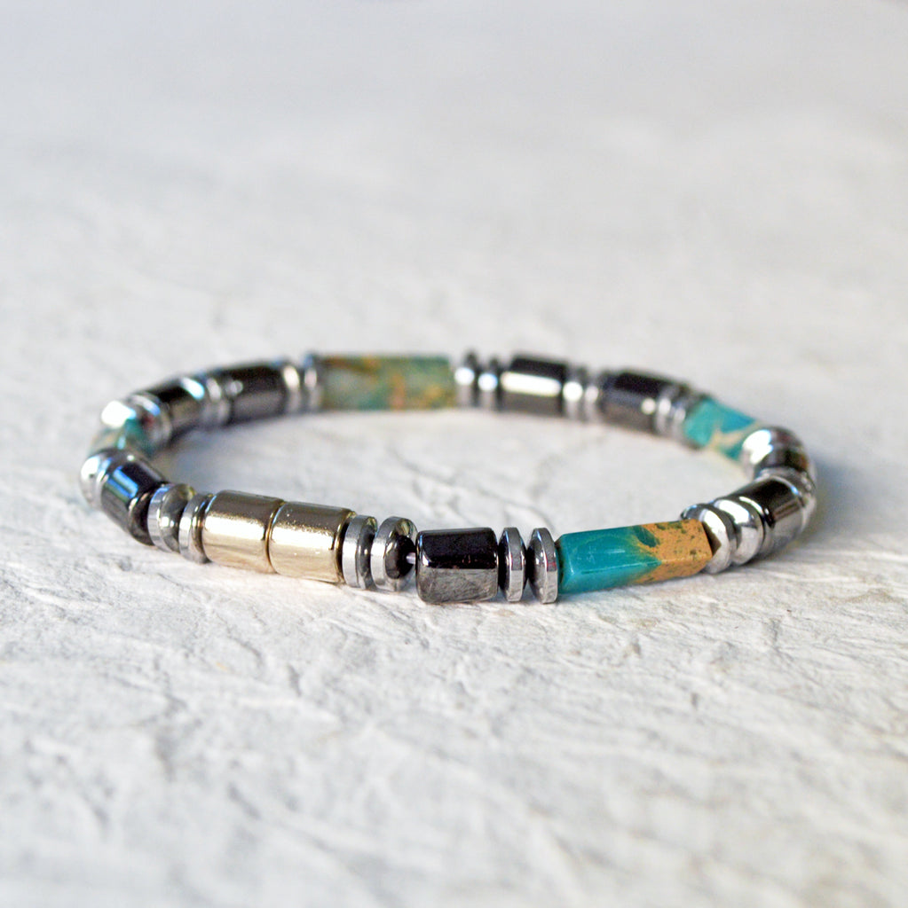 Magnetic bracelet handcrafted with black and silver magnetic hematite beads with impression jasper gemstone beads. Secured with a strong and easy-to-use magnetic clasp.