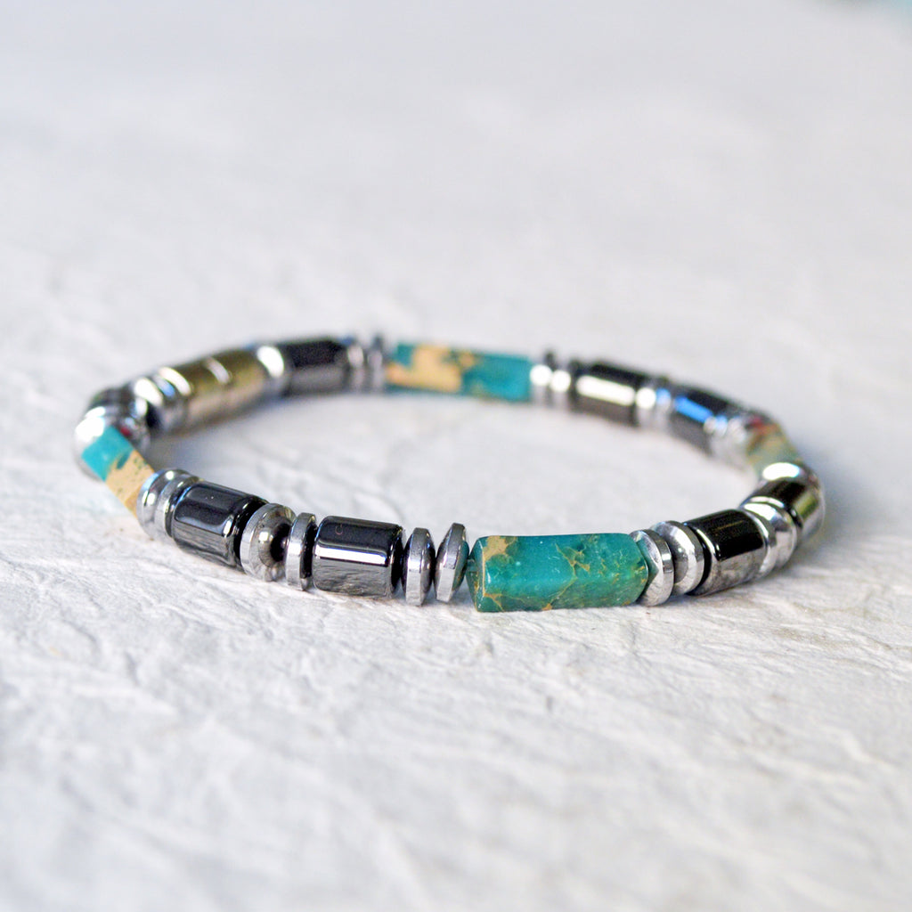Magnetic bracelet handcrafted with black and silver magnetic hematite beads with impression jasper gemstone beads. Secured with a strong and easy-to-use magnetic clasp.