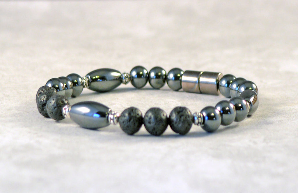 Handcrafted magnetic bracelet withh black high power hematite magnetic beads, lava rock beads, antique silver spacer beads. Secured with a strong magnetic clasp.
