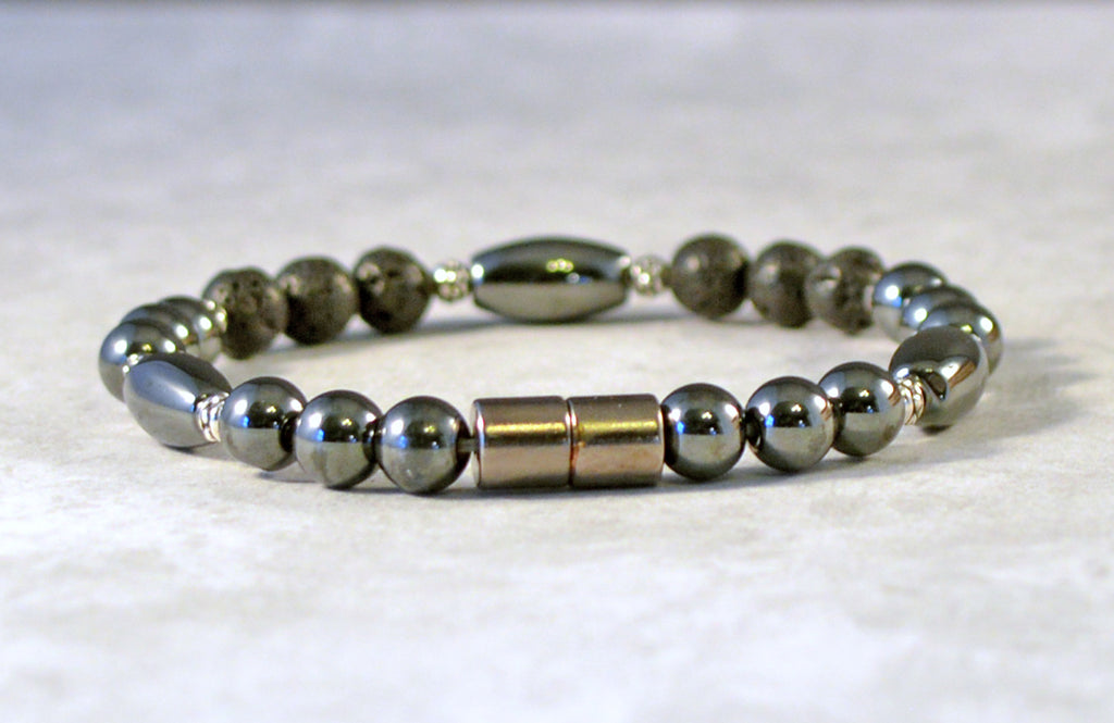 Handcrafted magnetic bracelet withh black high power hematite magnetic beads, lava rock beads, antique silver spacer beads. Secured with a strong magnetic clasp.