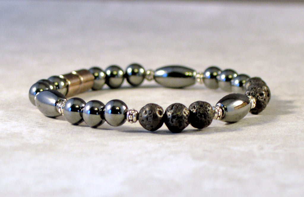 Handcrafted magnetic bracelet withh black high power hematite magnetic beads, lava rock beads, antique silver spacer beads. Secured with a strong magnetic clasp.