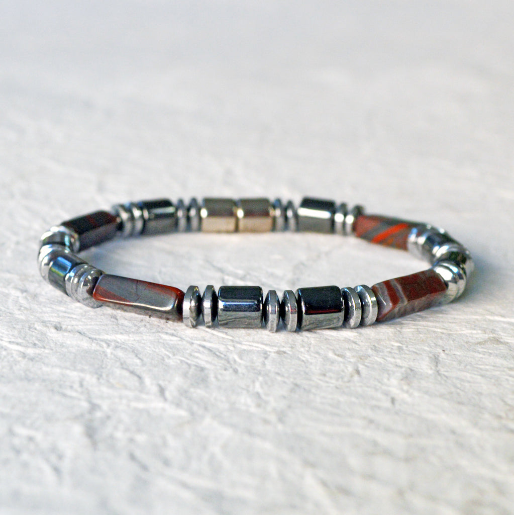 Magnetic bracelet handcrafted with black and silver hematite magnetic beads and tiger iron gemstone beads. Bracelet is secured with a strong, easy-to-use magnetic clasp. Can be worn as a bracelet or ankle bracelet.