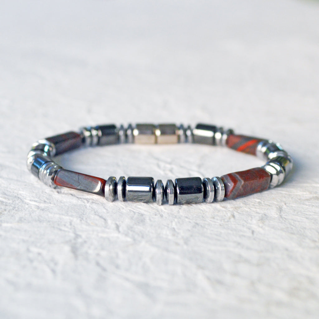 Magnetic bracelet handcrafted with black and silver hematite magnetic beads and tiger iron gemstone beads. Bracelet is secured with a strong, easy-to-use magnetic clasp. Can be worn as a bracelet or ankle bracelet.