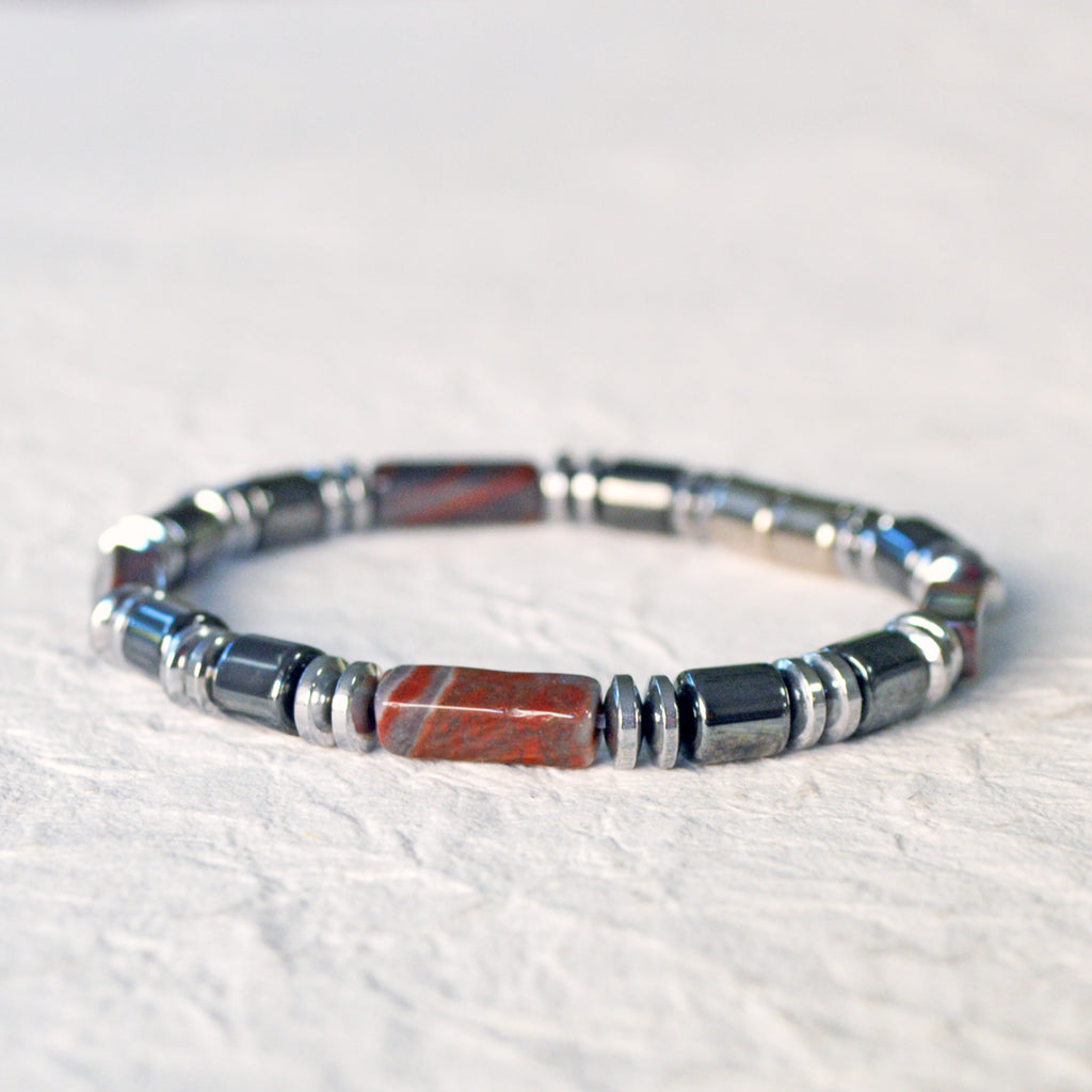 Magnetic bracelet handcrafted with black and silver hematite magnetic beads and tiger iron gemstone beads. Bracelet is secured with a strong, easy-to-use magnetic clasp. Can be worn as a bracelet or ankle bracelet.