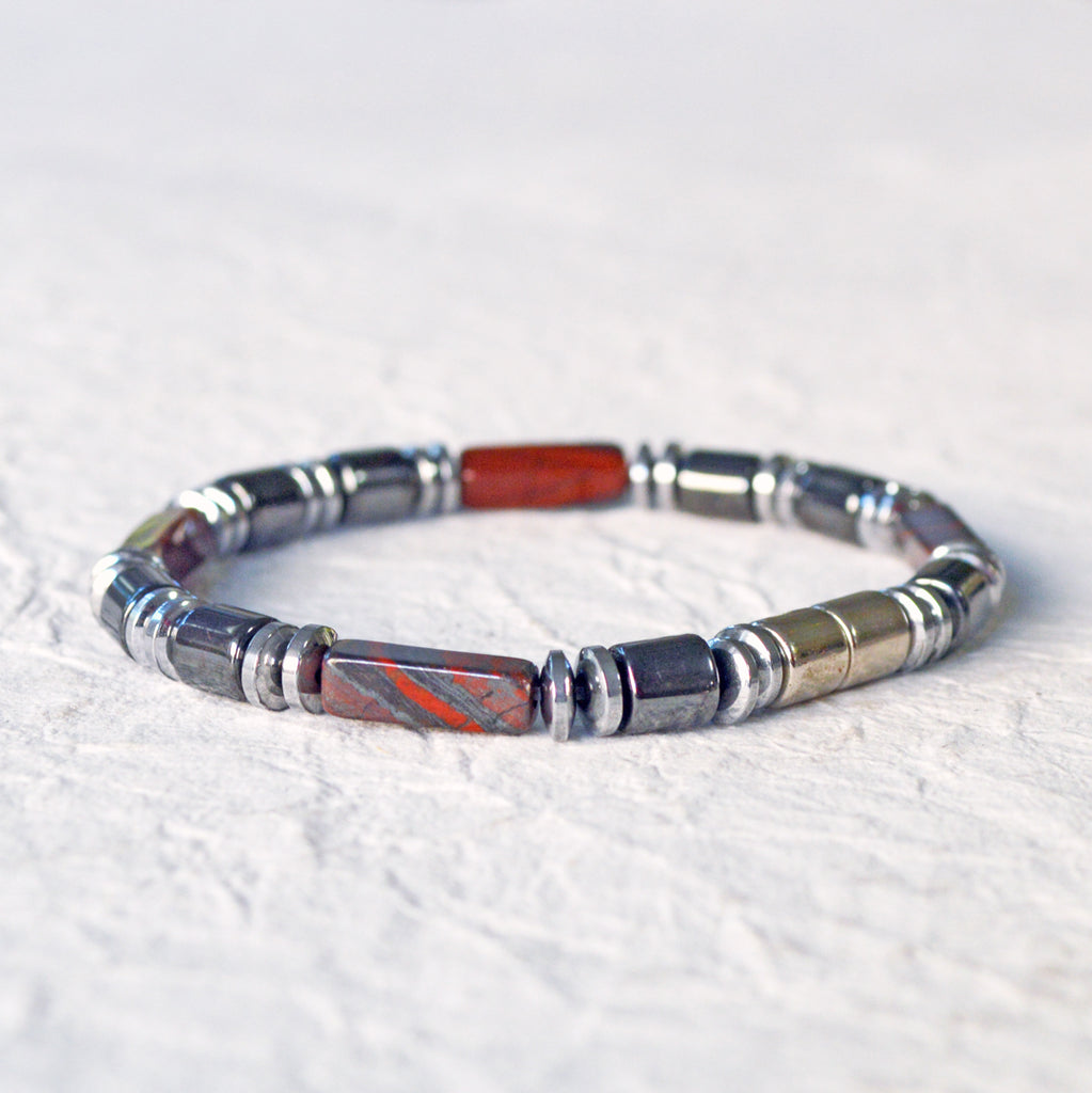 Magnetic bracelet handcrafted with black and silver hematite magnetic beads and tiger iron gemstone beads. Bracelet is secured with a strong, easy-to-use magnetic clasp. Can be worn as a bracelet or ankle bracelet.