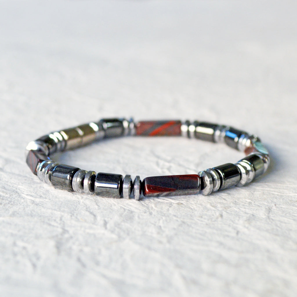 Magnetic bracelet handcrafted with black and silver hematite magnetic beads and tiger iron gemstone beads. Bracelet is secured with a strong, easy-to-use magnetic clasp. Can be worn as a bracelet or ankle bracelet.