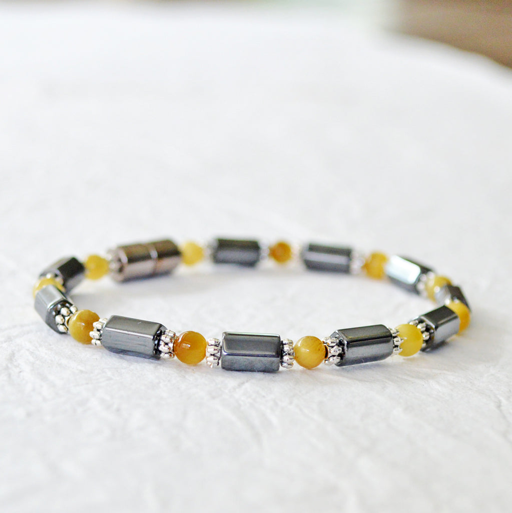 Black Hematite Magnetic Bracelet with Golden Tiger's Eye gemstone beads. Secured with a strong magnetic clasp.