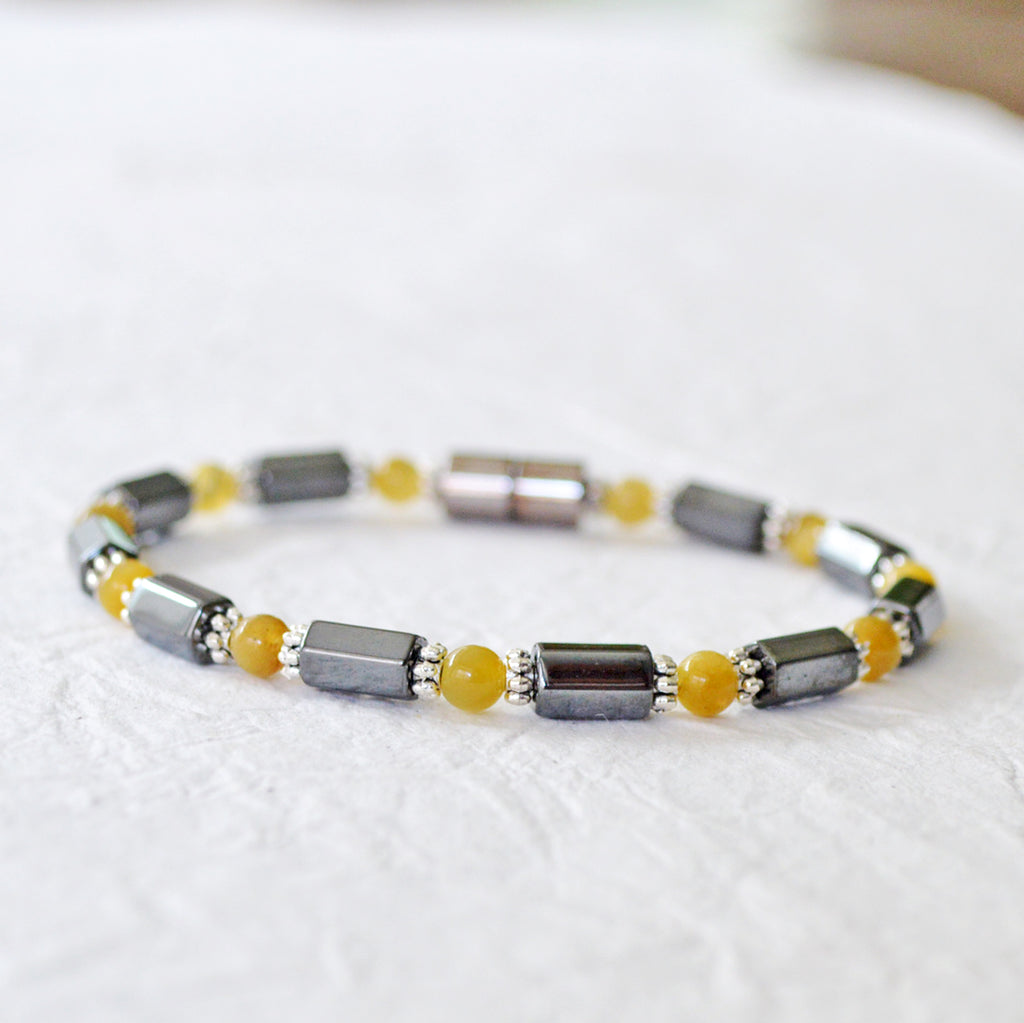 Black Hematite Magnetic Bracelet with Golden Tiger's Eye gemstone beads. Secured with a strong magnetic clasp.