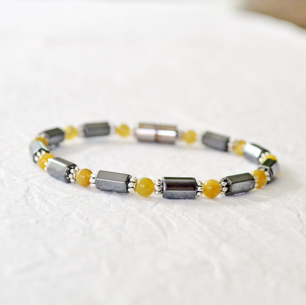Black Hematite Magnetic Bracelet with Golden Tiger's Eye gemstone beads. Secured with a strong magnetic clasp.