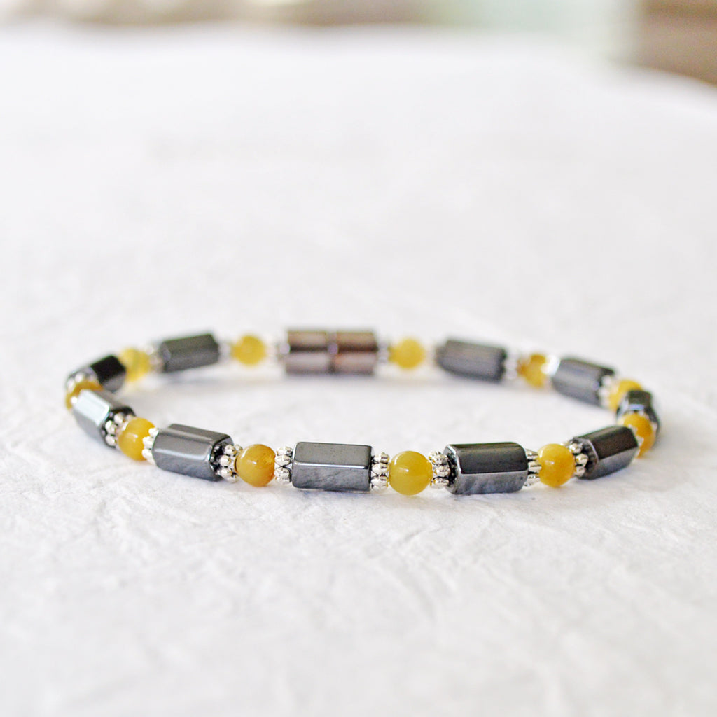 Black Hematite Magnetic Bracelet with Golden Tiger's Eye gemstone beads. Secured with a strong magnetic clasp.