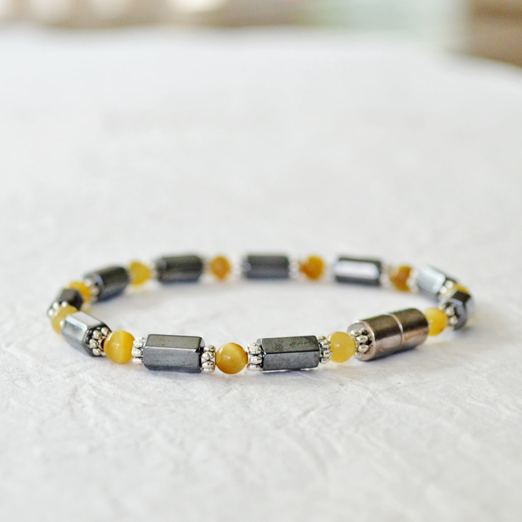 Black Hematite Magnetic Bracelet with Golden Tiger's Eye gemstone beads. Secured with a strong magnetic clasp.