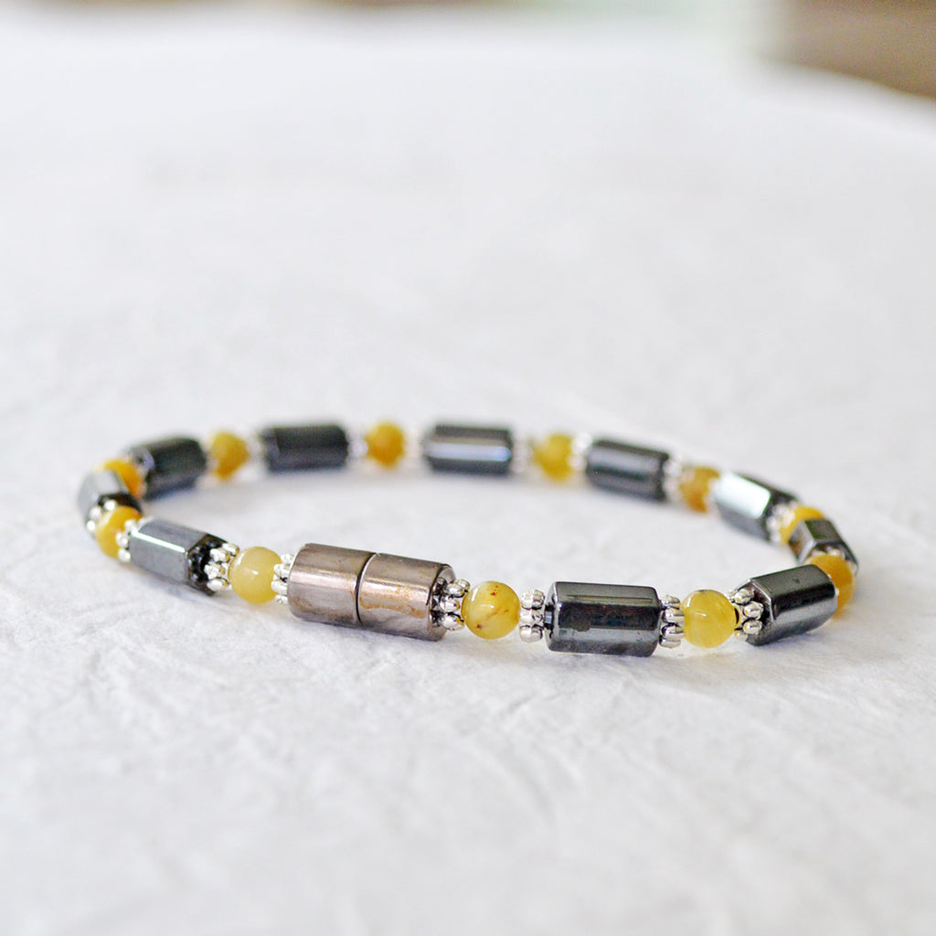 Black Hematite Magnetic Bracelet with Golden Tiger's Eye gemstone beads. Secured with a strong magnetic clasp.
