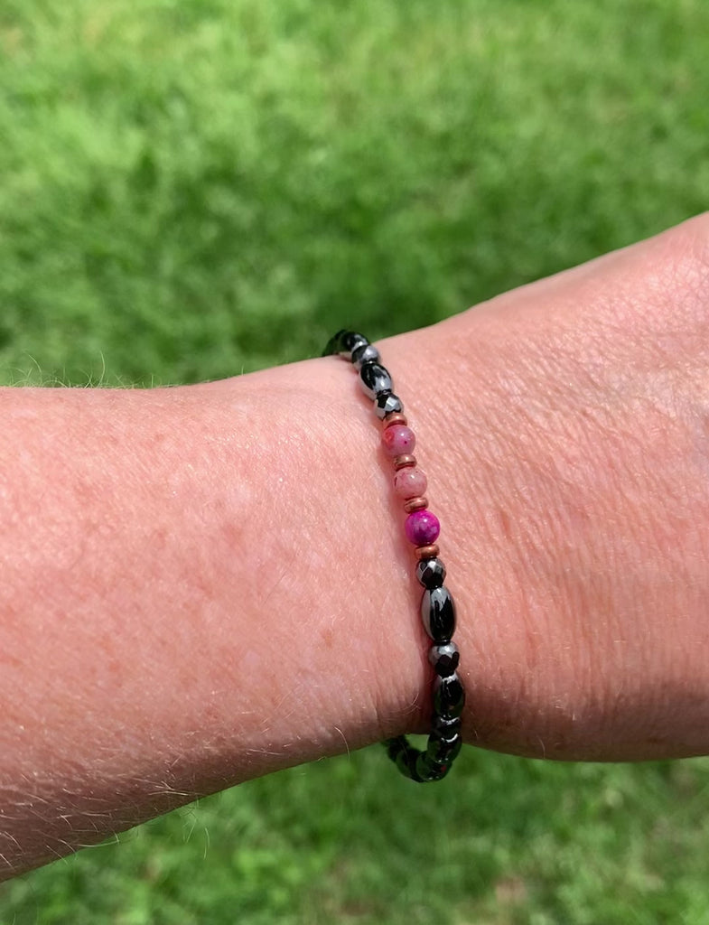 Magnetic therapy bracelet handcrafted with high power black hematite magnetic beads. In the center are 3 purple crazy lace gemstone beads surrounded by antique copper spacer beads. Secured with strong magnetic clasp. Wears great as a magnetic bracelet or magnetic anklet.