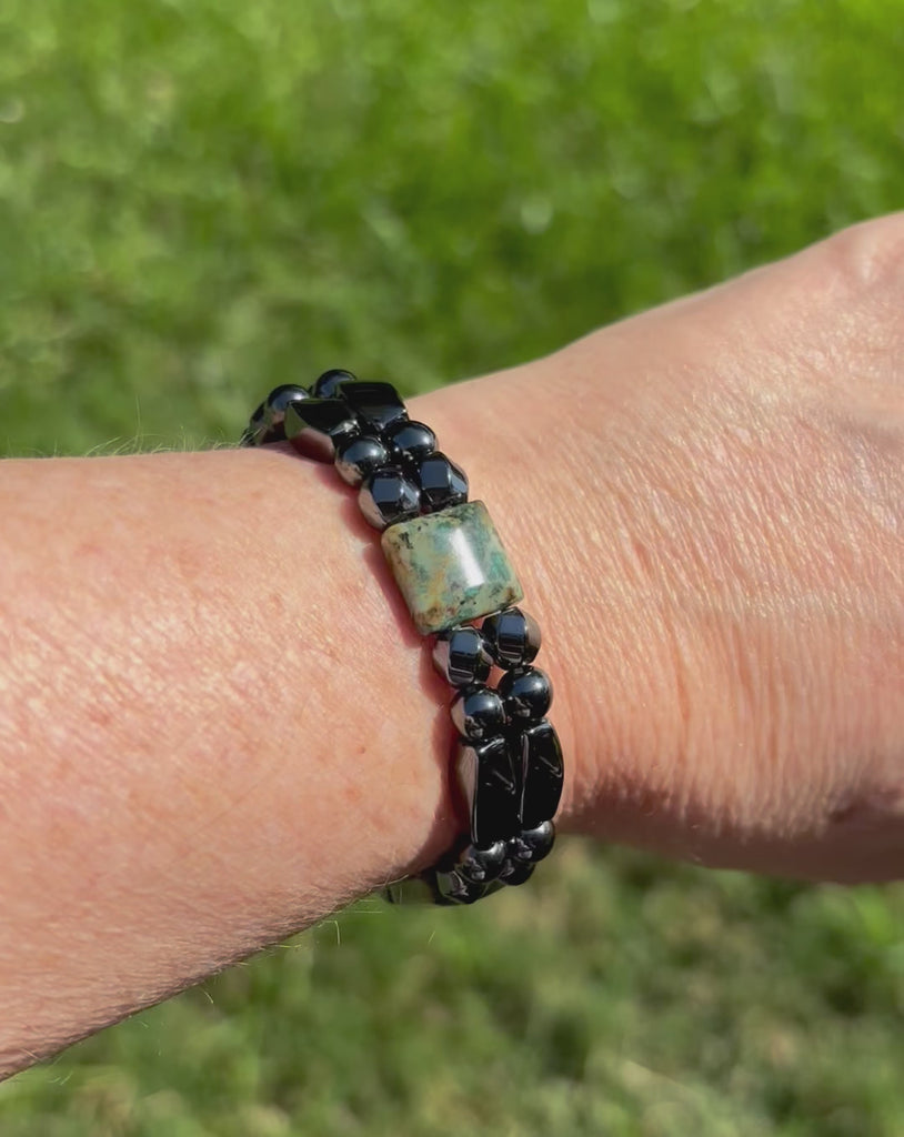 Handcrafted two strand magnetic bracelet with powerful black magnetic hematite beads and african turquoise jasper gemstone beads. Bracelet is secured with a strong and easy-to-use magnetic clasp.