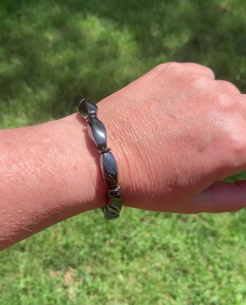 Magnetic therapy bracelet handcrafted with powerful black magnetic hematite beads and secured with a strong magnetic clasp.