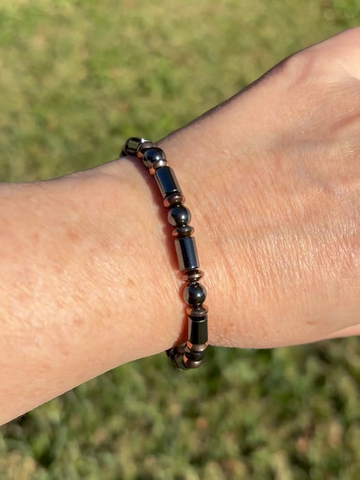 Black & Copper Magnetic Hematite bracelet handcrafted with powerful magnetic hematite beads. Bracelet is secured with a strong and easy-to-use magnetic clasp.