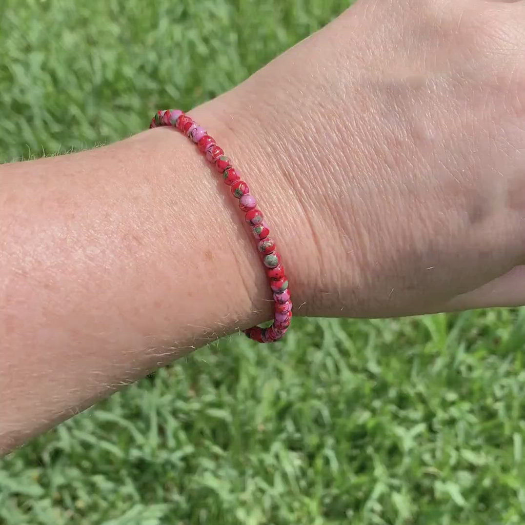 Magnetic pain relief bracelet handcrafted with red picasso hematite magnetic beads and secured with a strong and easy-to-use rare earth magnetic clasp.