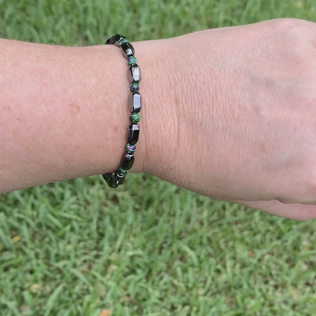 Magnetic bracelet handcrafted with black hematite and green picasso hematite magnetic beads. It is secured with a strong magnetic clasp. Wear as a magnetic bracelet or magnetic ankle bracelet.